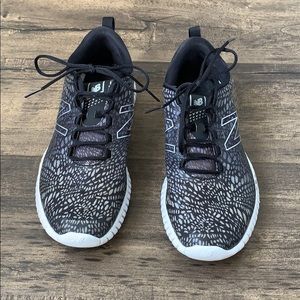 Women’s size 8 New Balance sneakers.